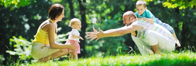 Family Playing on the Garden
